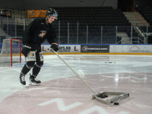 Puck-oppsamler for ishall og hockeytrening